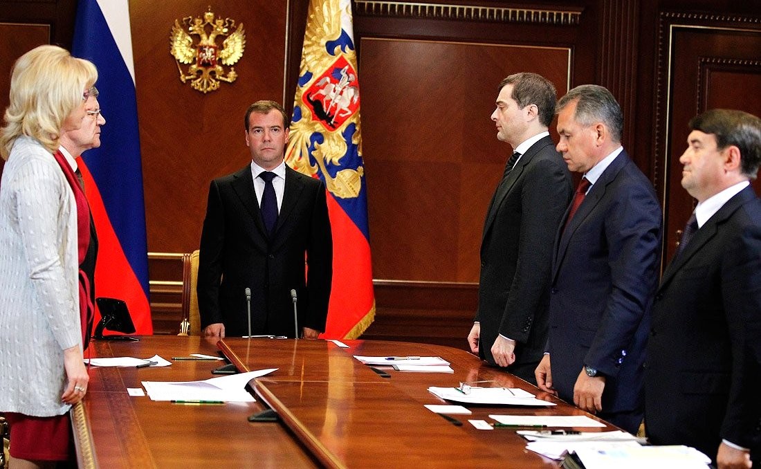 Russian president Dmitry Medvedev holds a moment of silence, 11 July 2011.