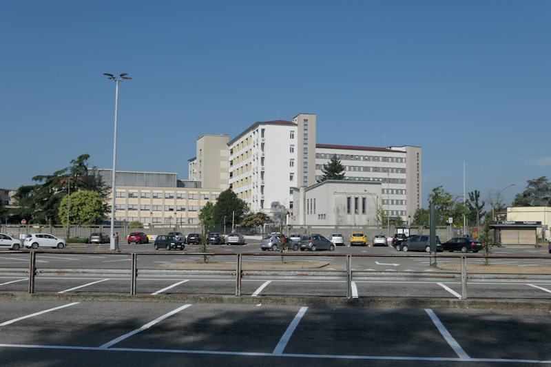 View. In front, the church of the Santissimo Salvatore can be seen; on the left, the emergency-urgency "Piastra" (slab building).