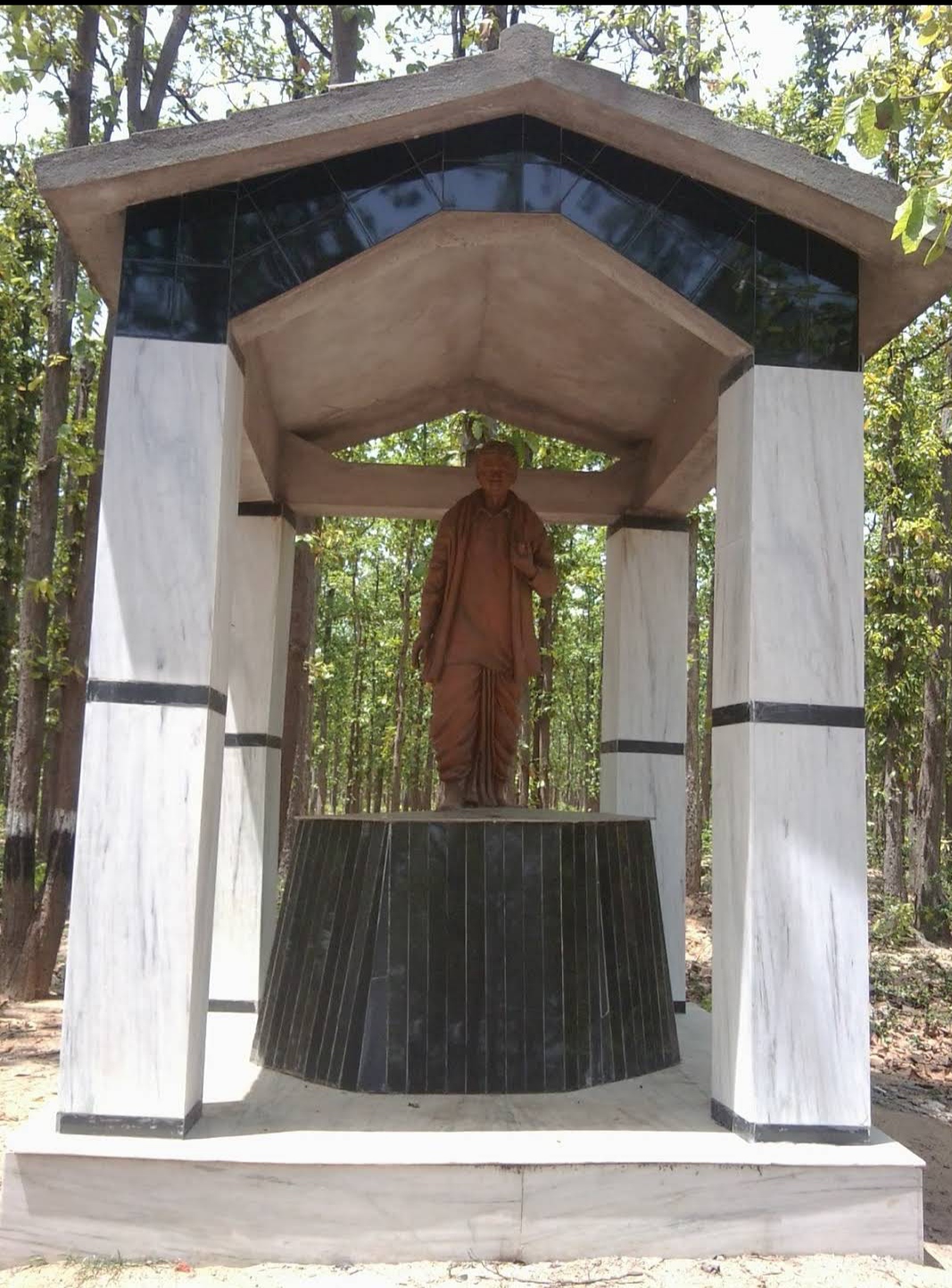 Statue Of Pandit Raghunath Murmu beside main entrance