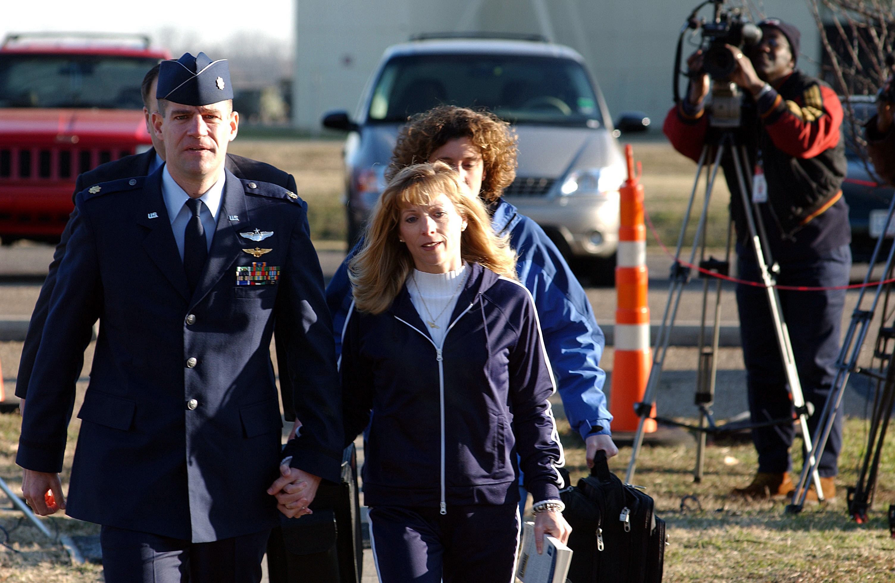 Major Harry Schmidt and his wife on the way to his hearing