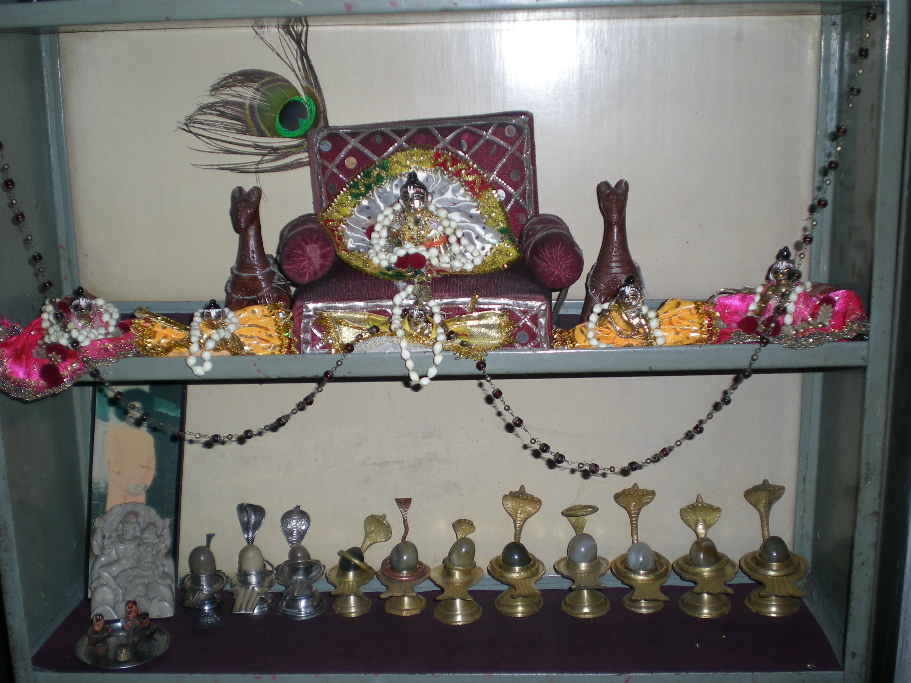 few of the many gopals and shiv lings received by the temple