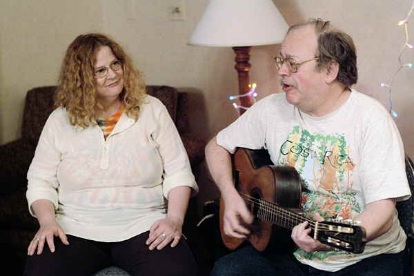 Louie and Nate playing in an informal music circle, 2003