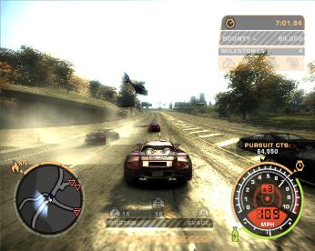 The player's car is in pursuit by several undercover state police cars and a police helicopter in Free Roam mode. This screen-shot also depicts the use of simulated HDRR on the sunny sky and surface lighting.