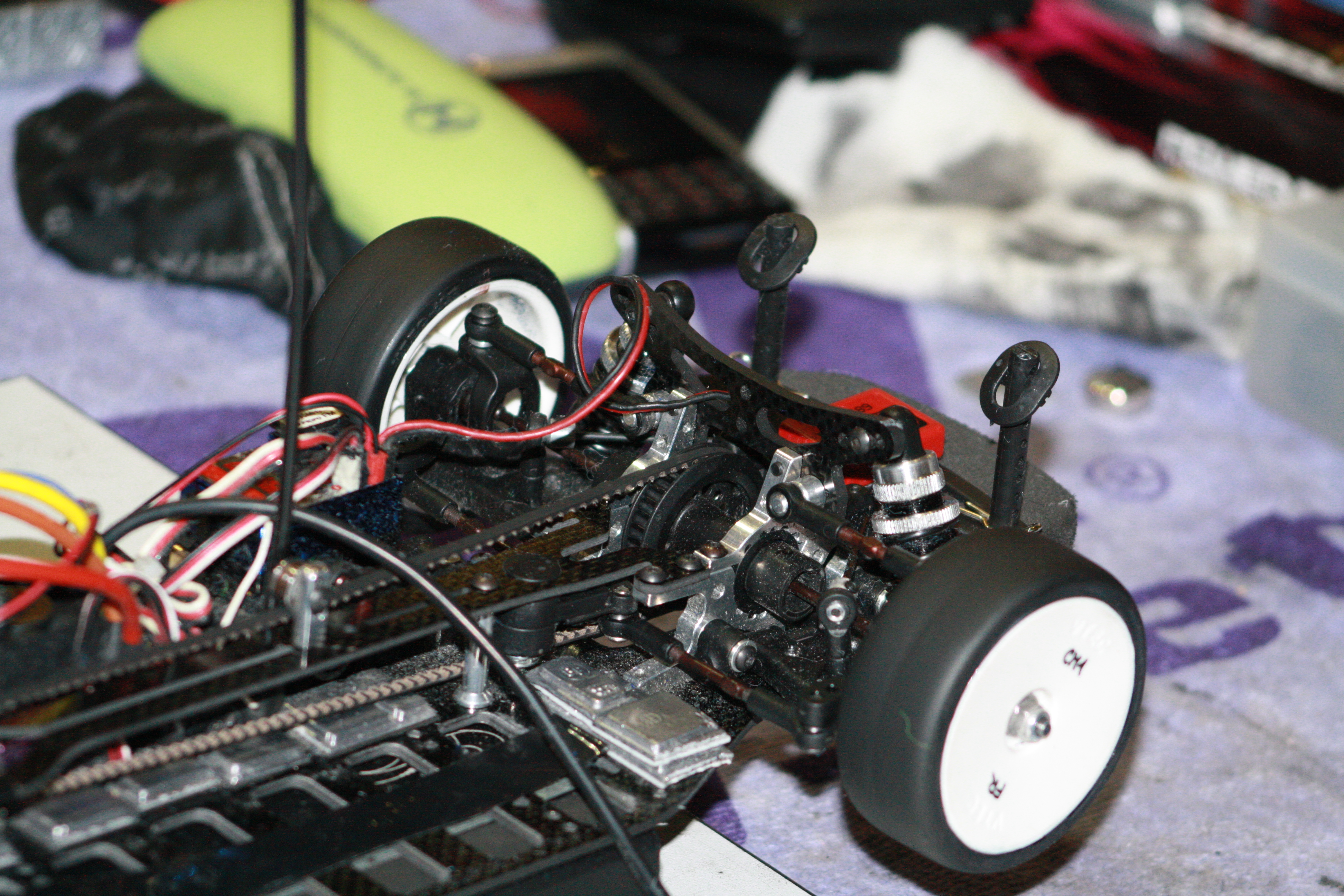 Motor and wheels of XRAY RC car.