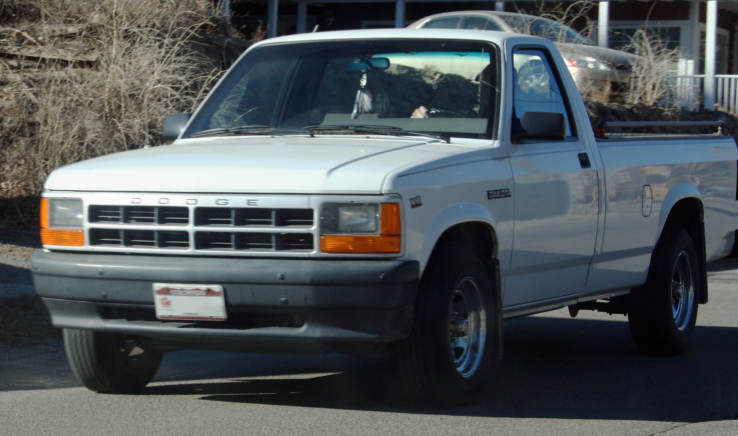 This vehicle had a grille that was compatible with both sealed and composite headlamps